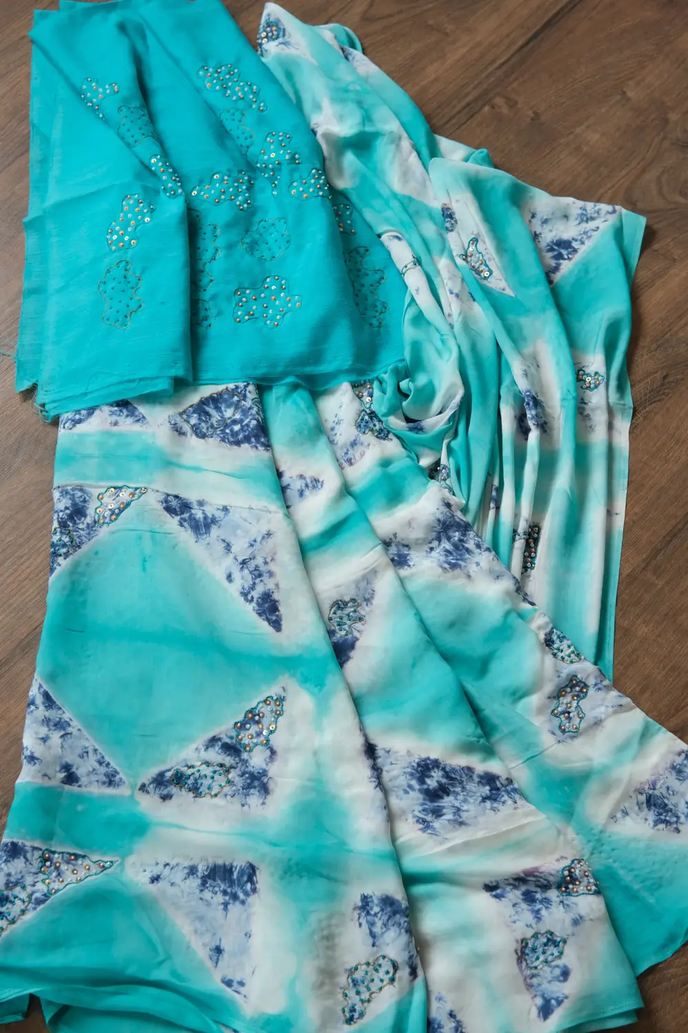 Blue muslin silk hand dyed highlightwork saree