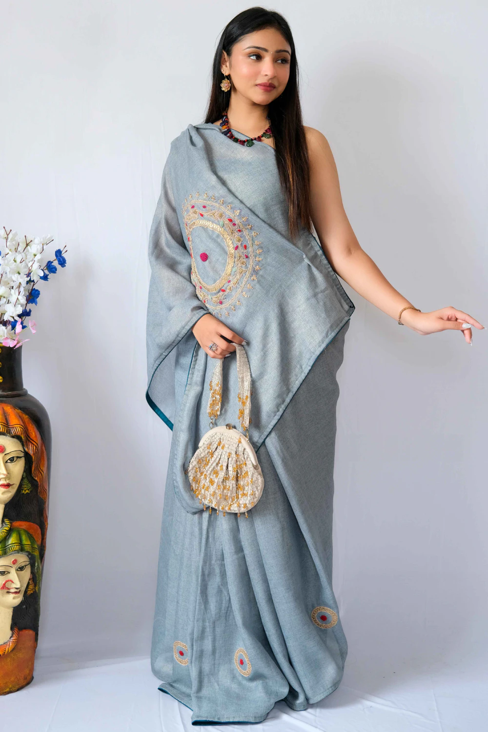 turquoise jute shimmer marodi work saree