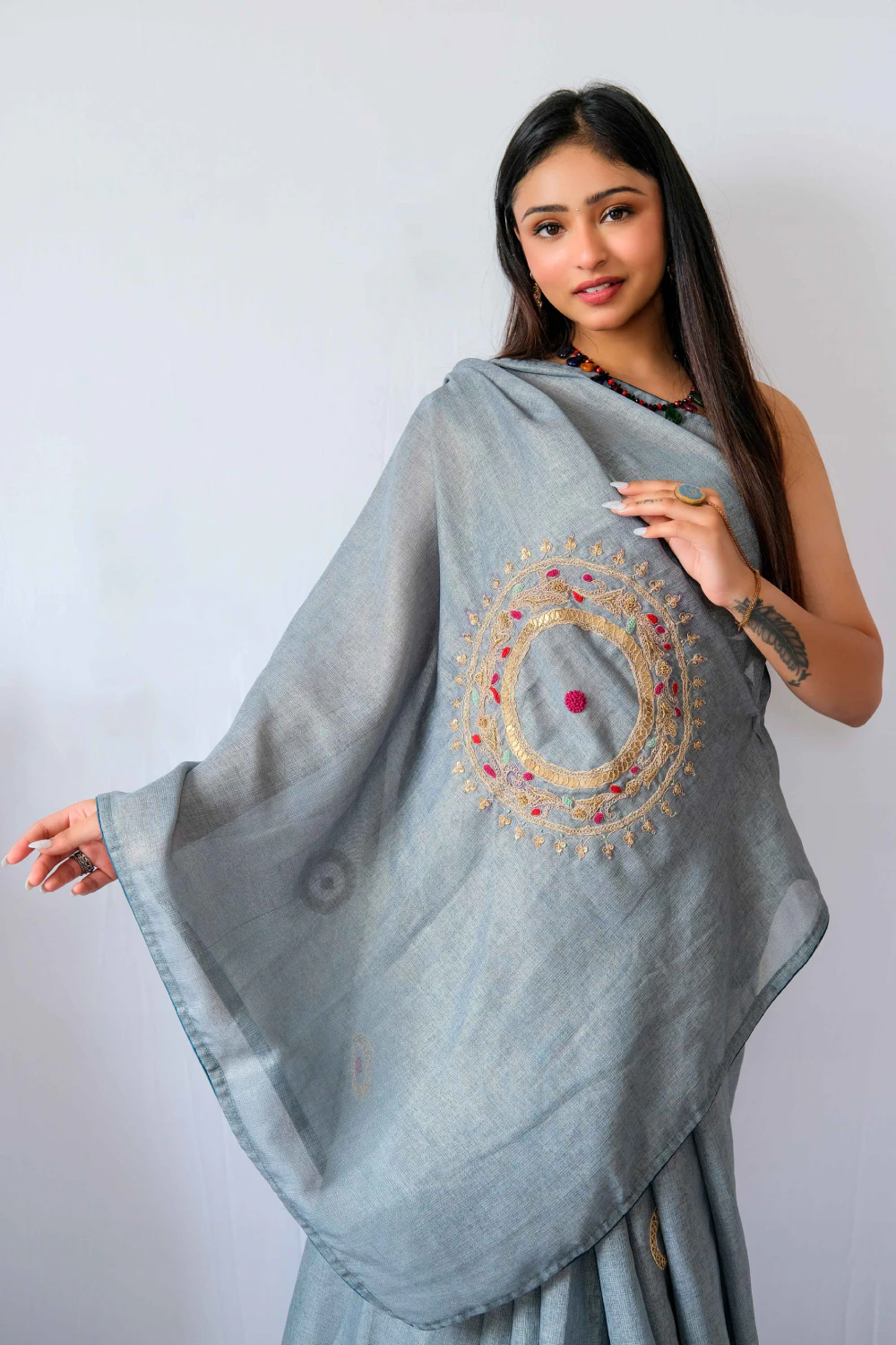 turquoise jute shimmer marodi work saree
