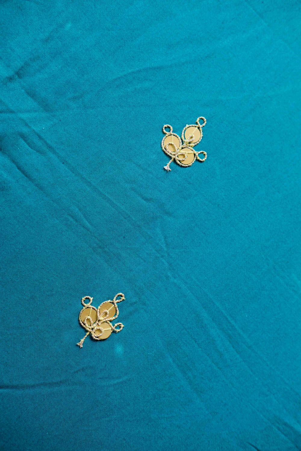 Turquoise jute shimmer marodi work saree